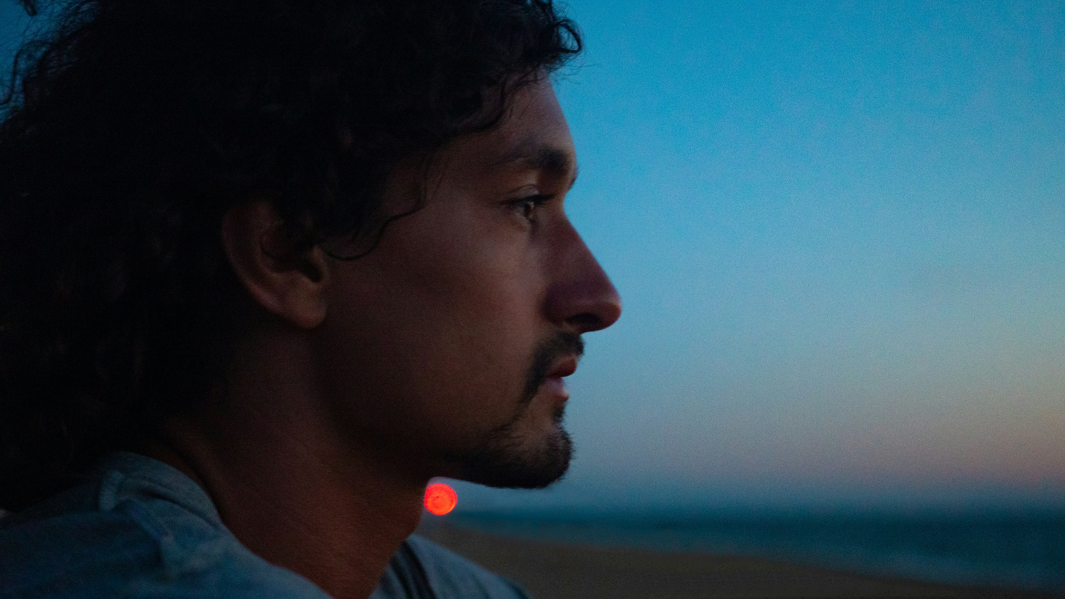 man in blue crew neck shirt