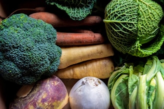 green and brown vegetables on brown wooden table