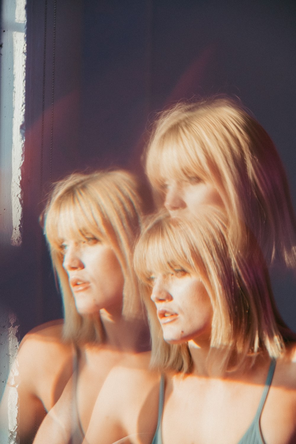 2 women smiling in front of the camera