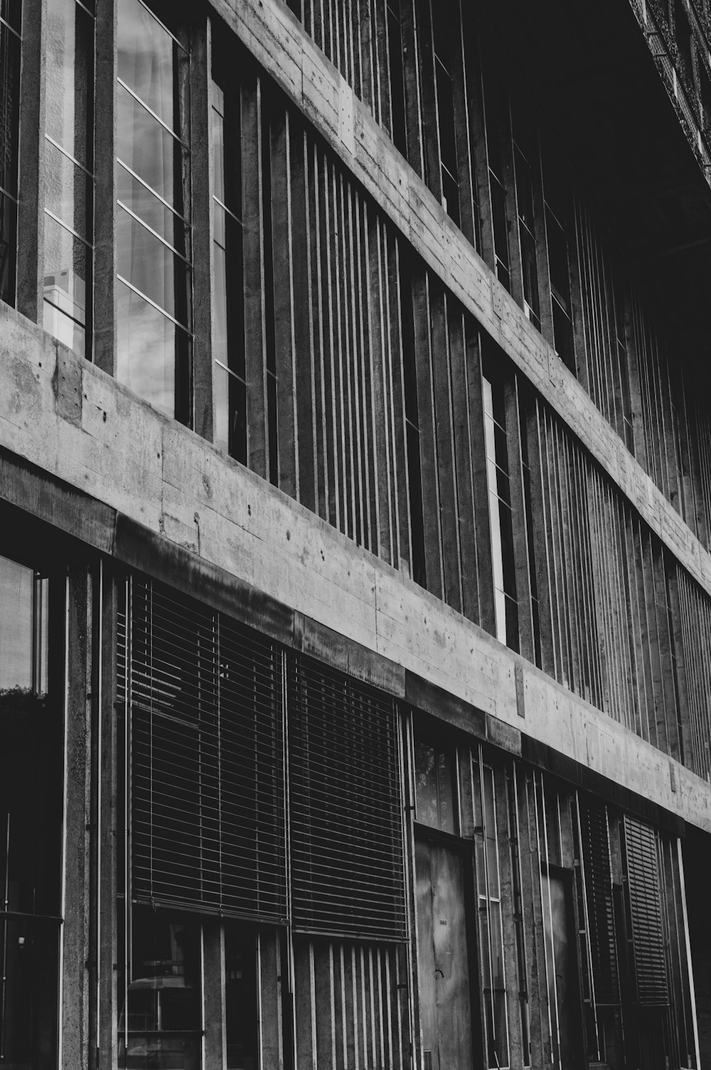 grayscale photo of concrete building