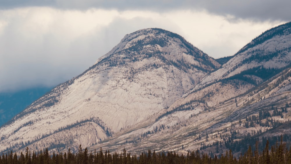 snow covered mountain during daytime