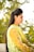 woman in yellow floral dress