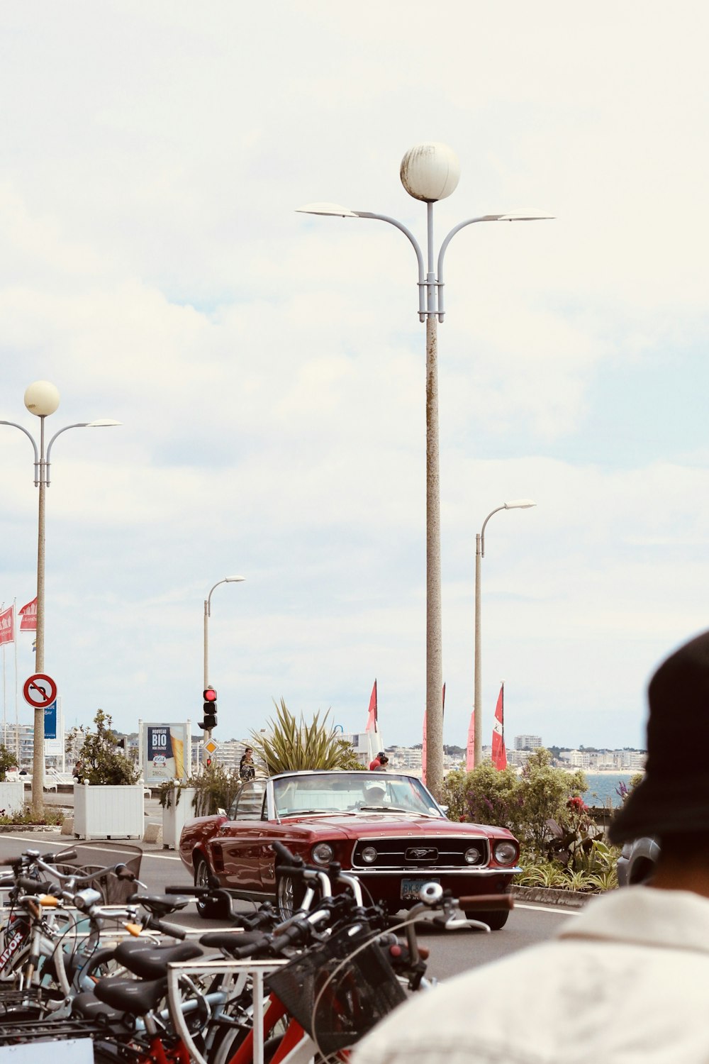 red car on road during daytime