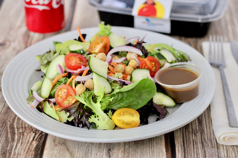 vegetable salad on white ceramic plate