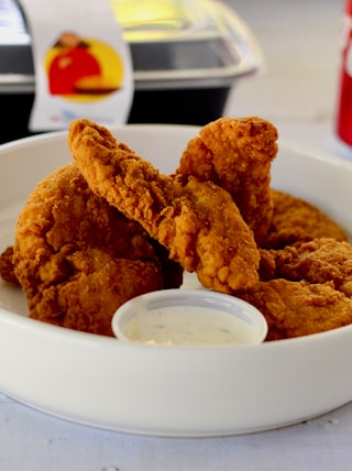 fried chicken on white ceramic plate