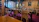 Cozy rustic dining table with traditional Modenese dishes and warm lighting