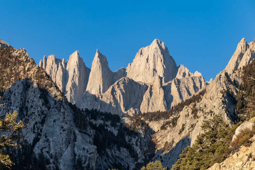 rocky mountain under blue sky during daytime