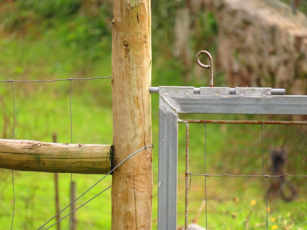 brown wooden fence with padlock