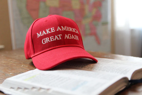 a red hat that reads make america great again