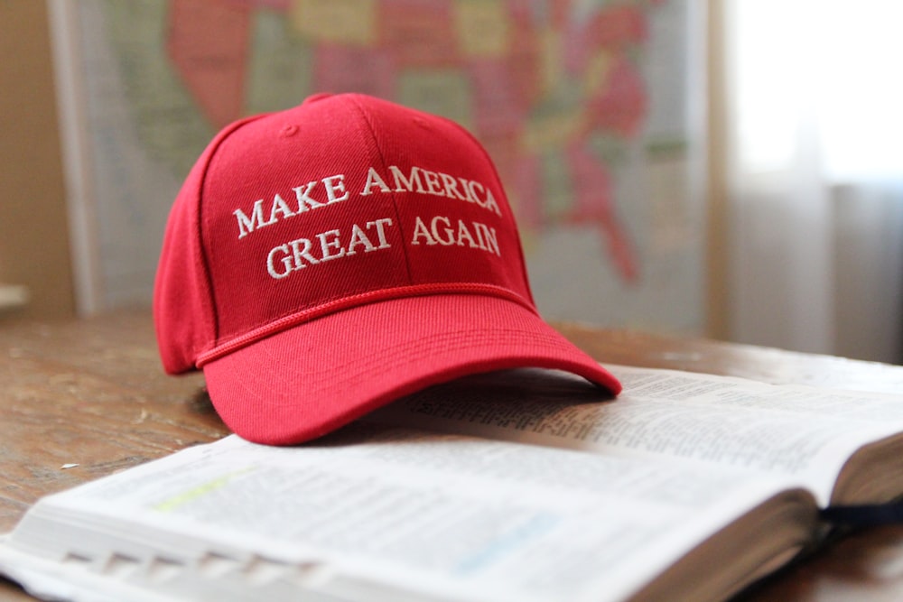 a red hat that reads make america great again