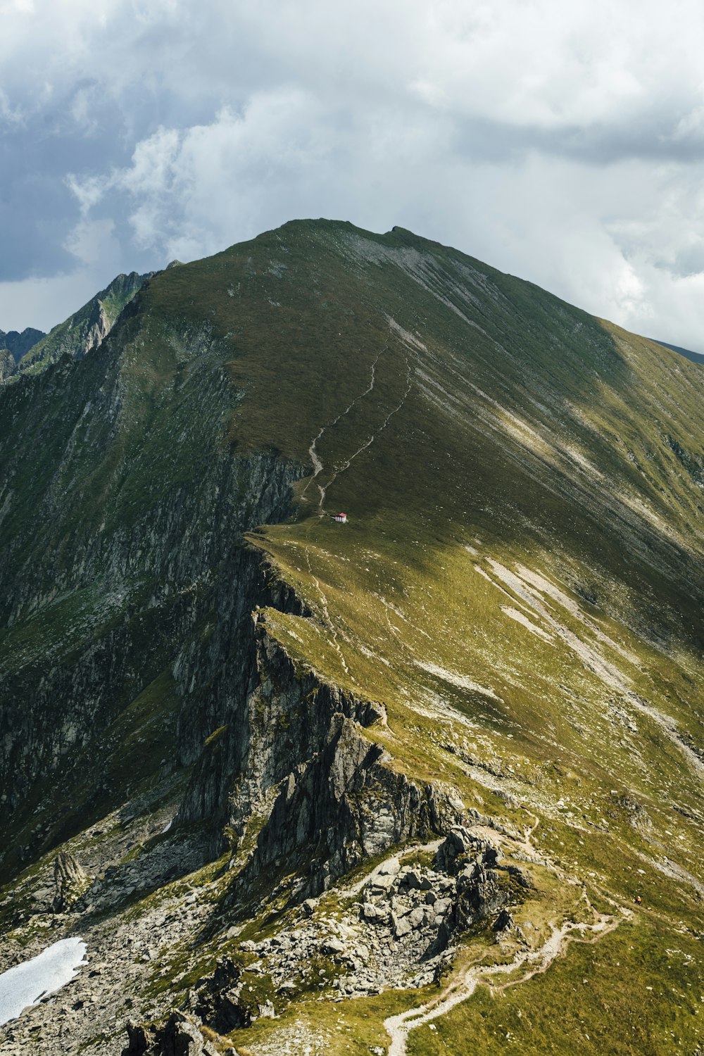 green and brown mountain under blue sky during daytime