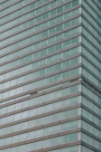A row of shiny, streak-free windows on a modern building in Vancouver.