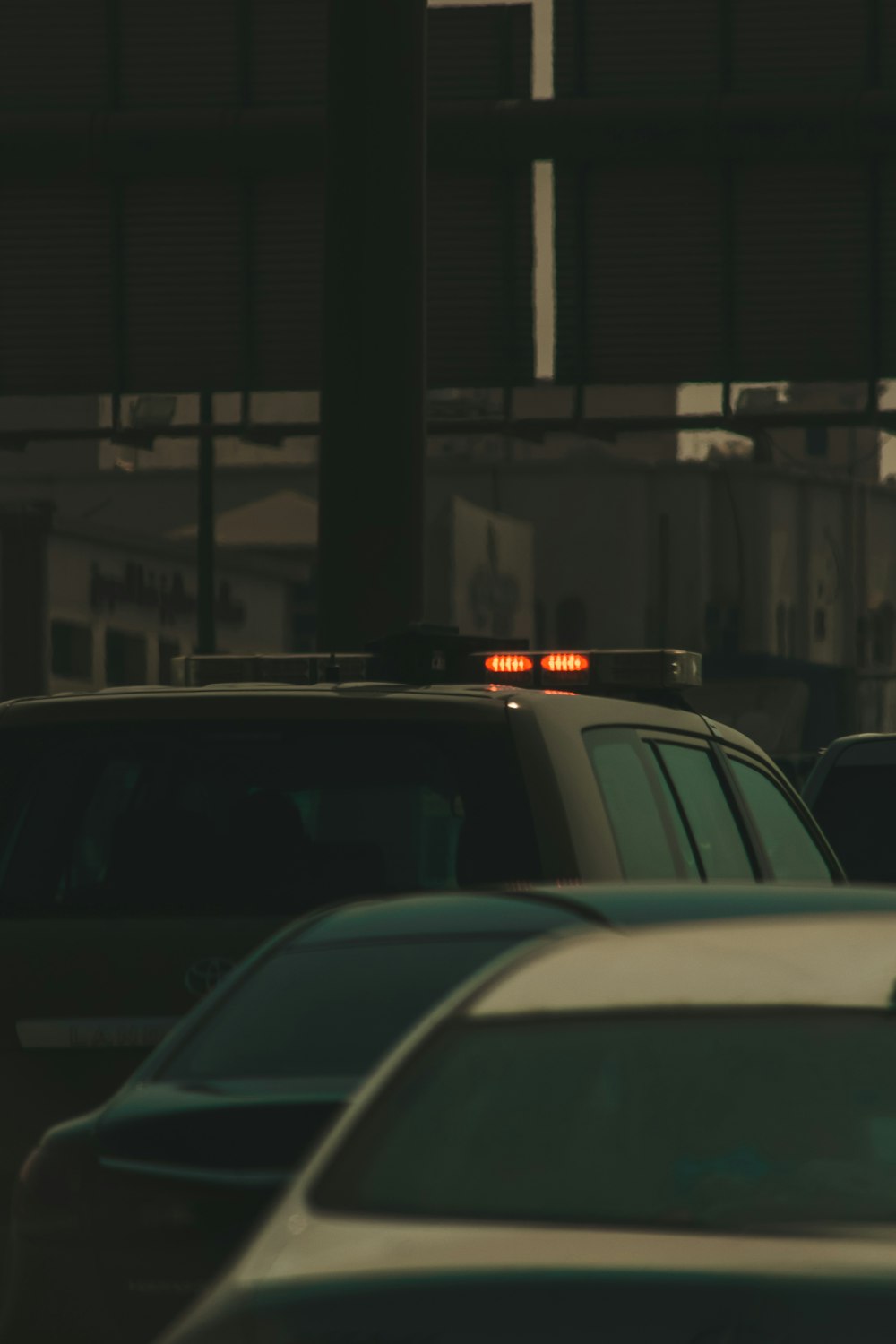 white car on road during night time