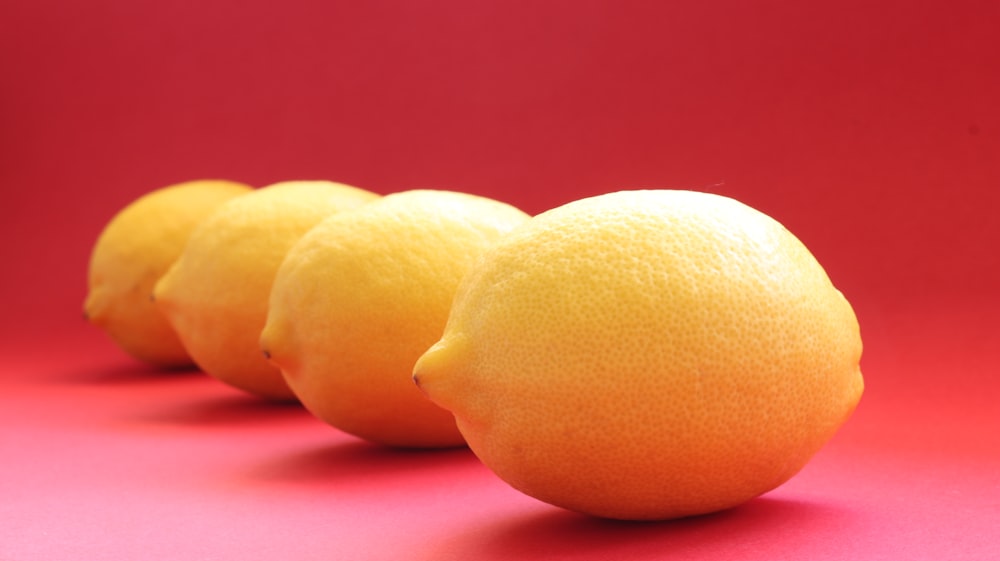 yellow fruit on pink textile