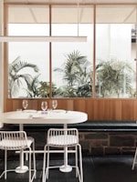 white and brown dining table and chairs