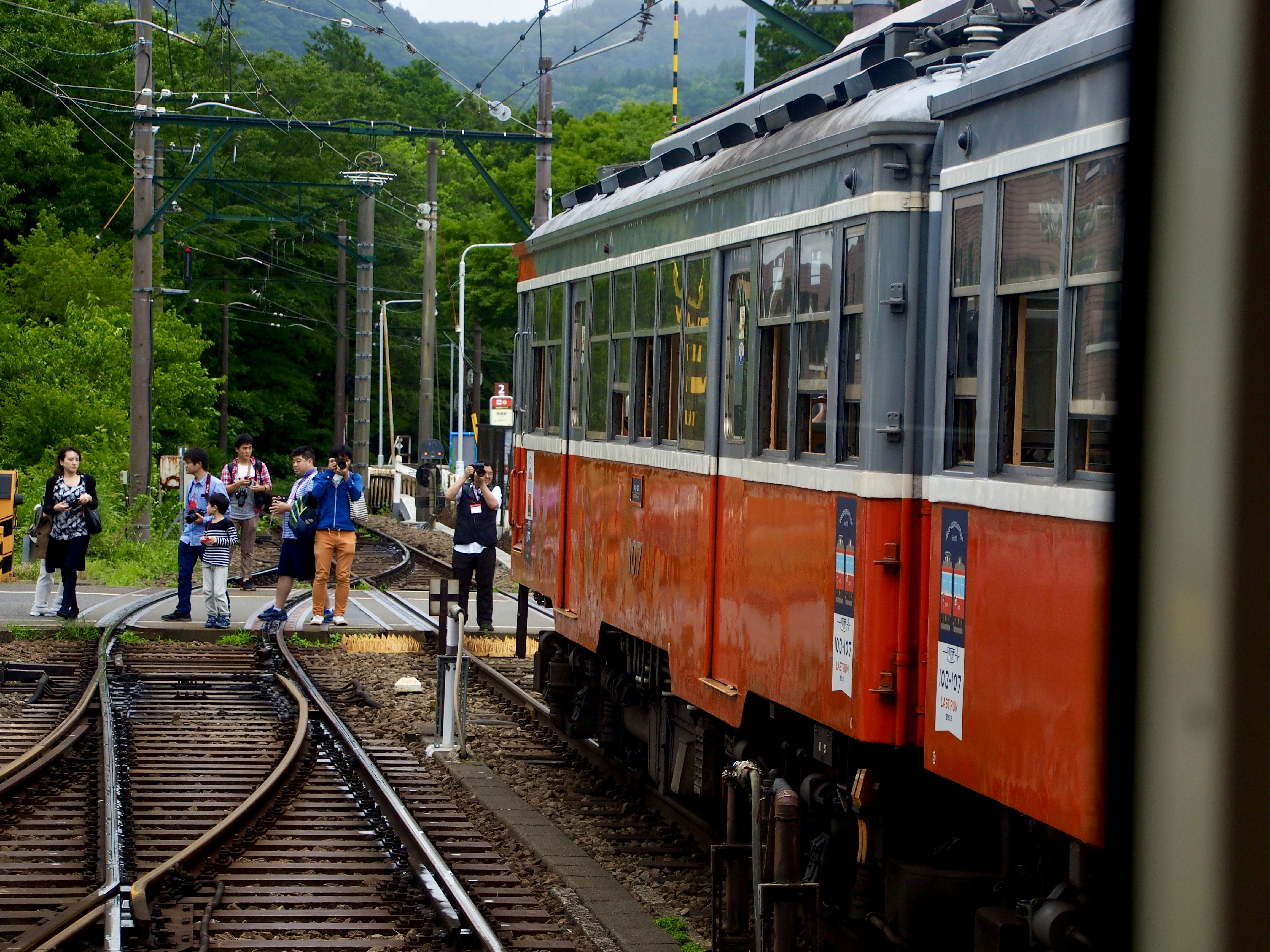 people standing on train station during daytime
