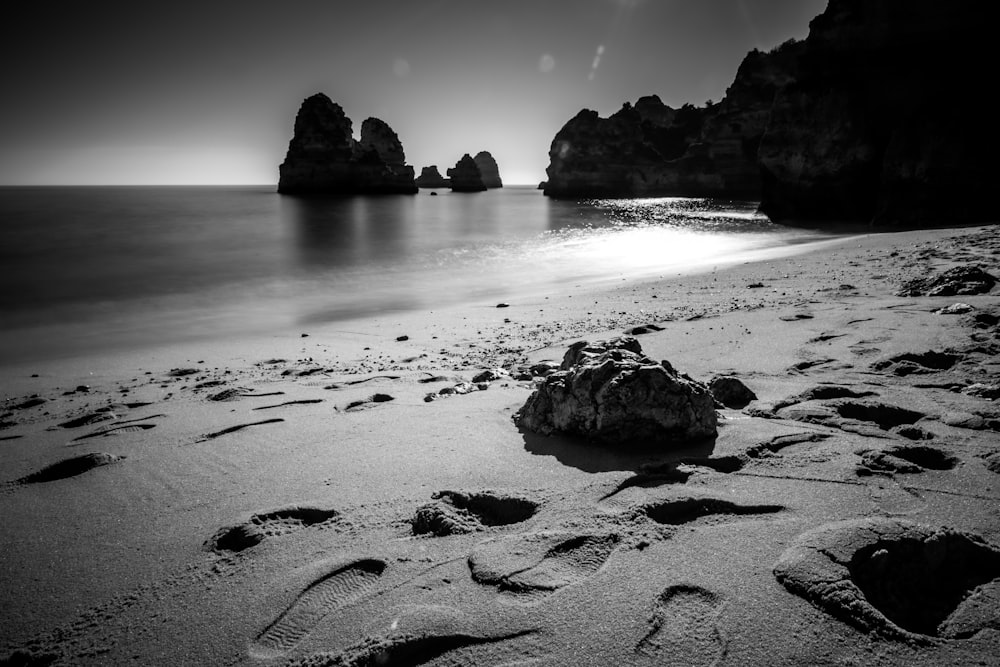 brown rock formation on seashore during daytime