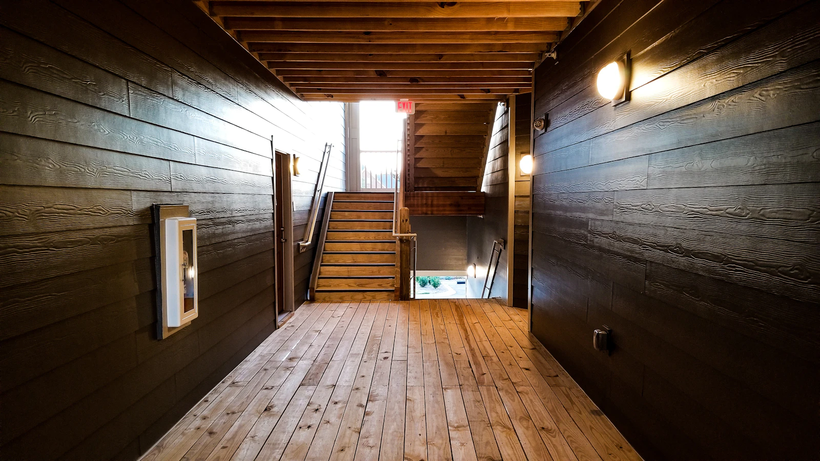 Brown wooden bench on wooden floor
