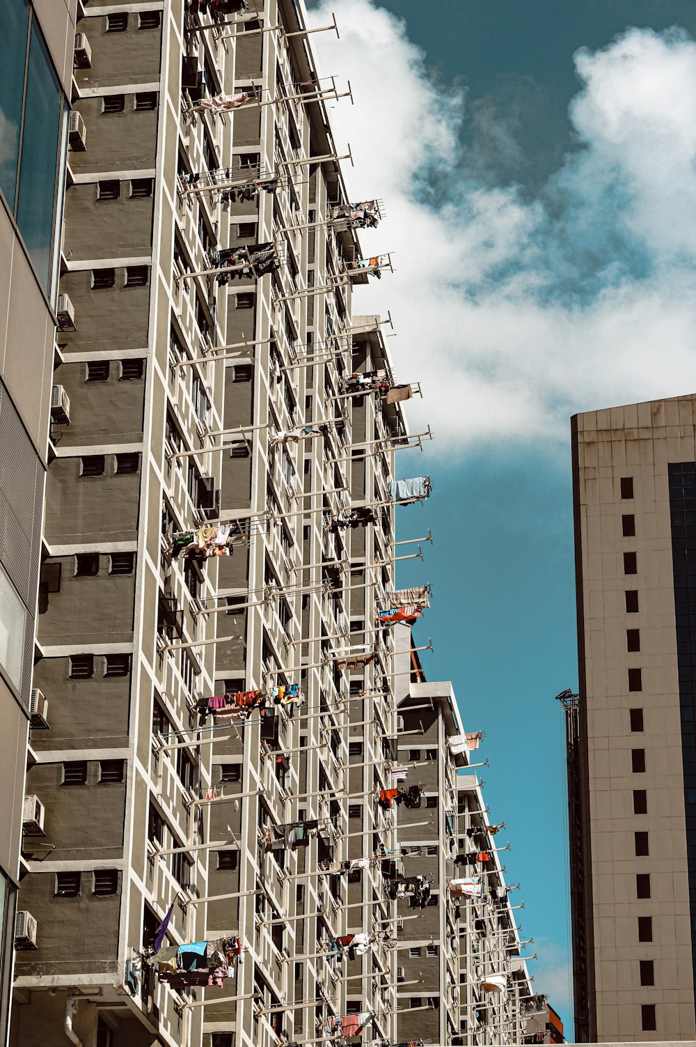 a very tall building with a sky background