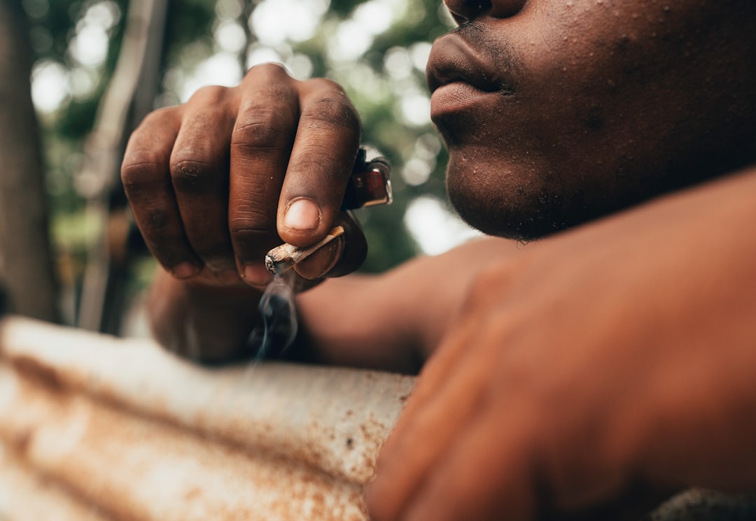 man with silver ring on his left hand