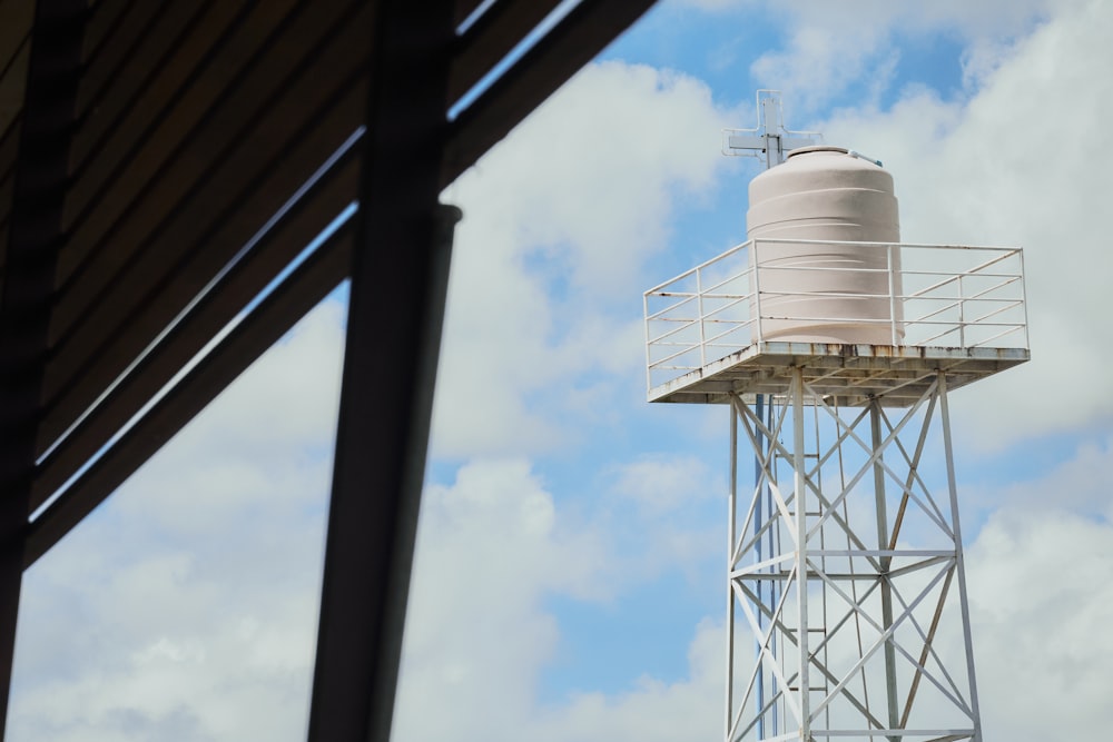 white and black metal tower under blue sky during daytime