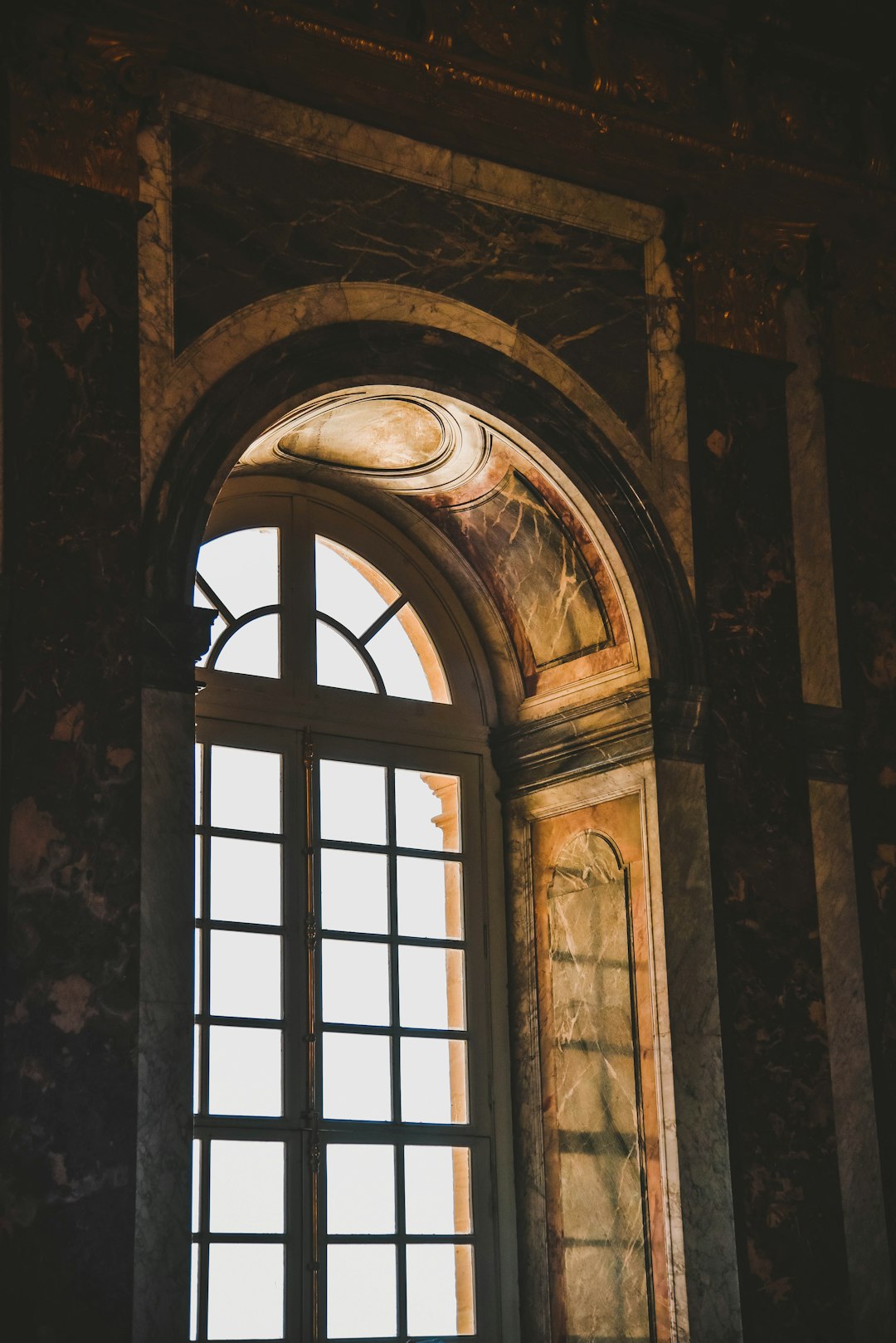 brown wooden framed glass window