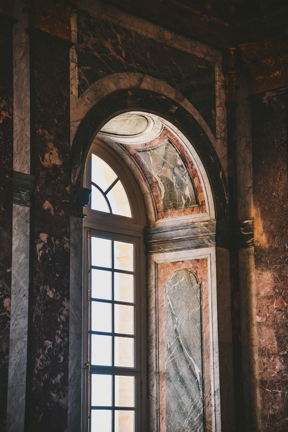 brown wooden framed glass window