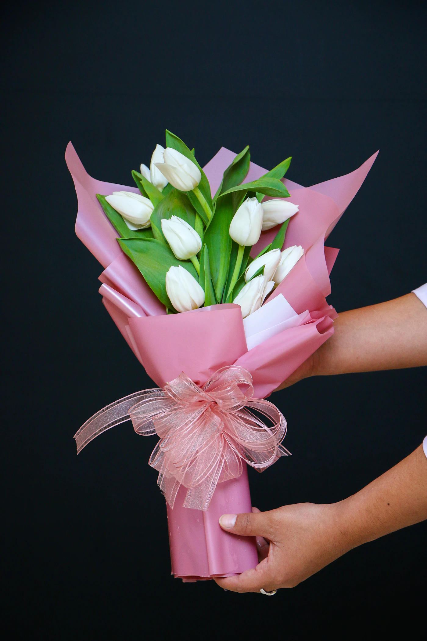 Soft pink and white rose bouquet, styled elegantly