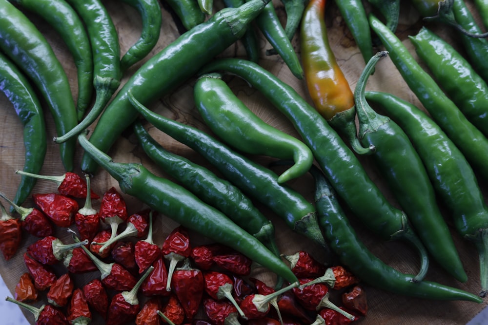 green chili peppers and red strawberries