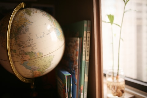 white and blue desk globe