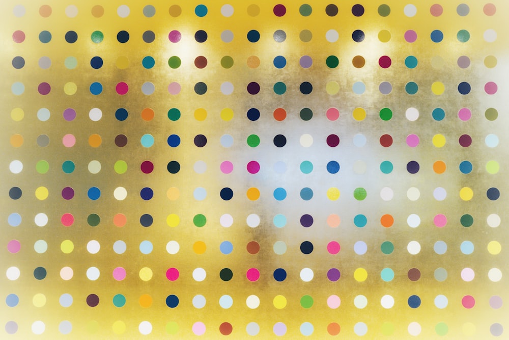 yellow pink and white polka dot illustration