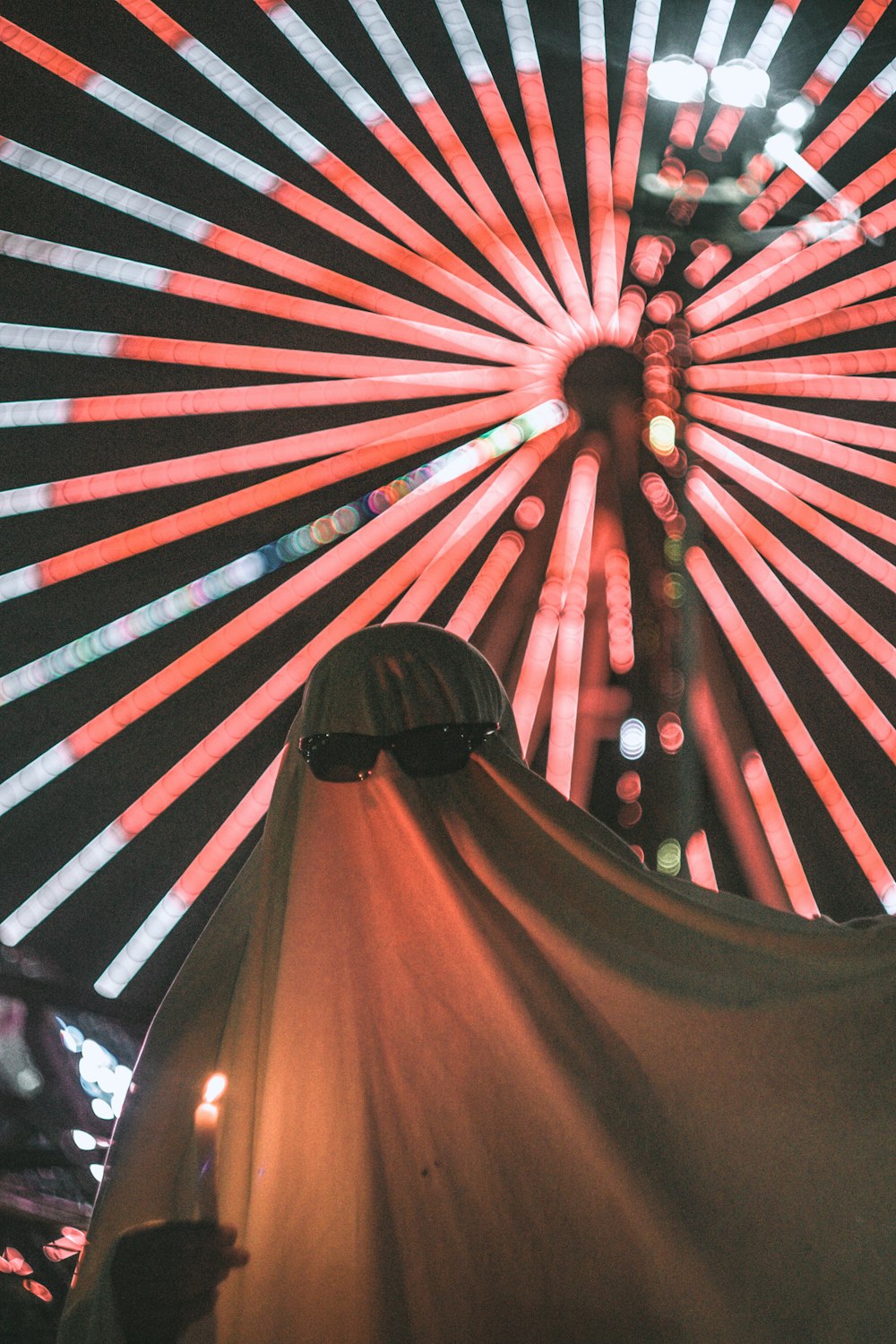 red and brown hand fan