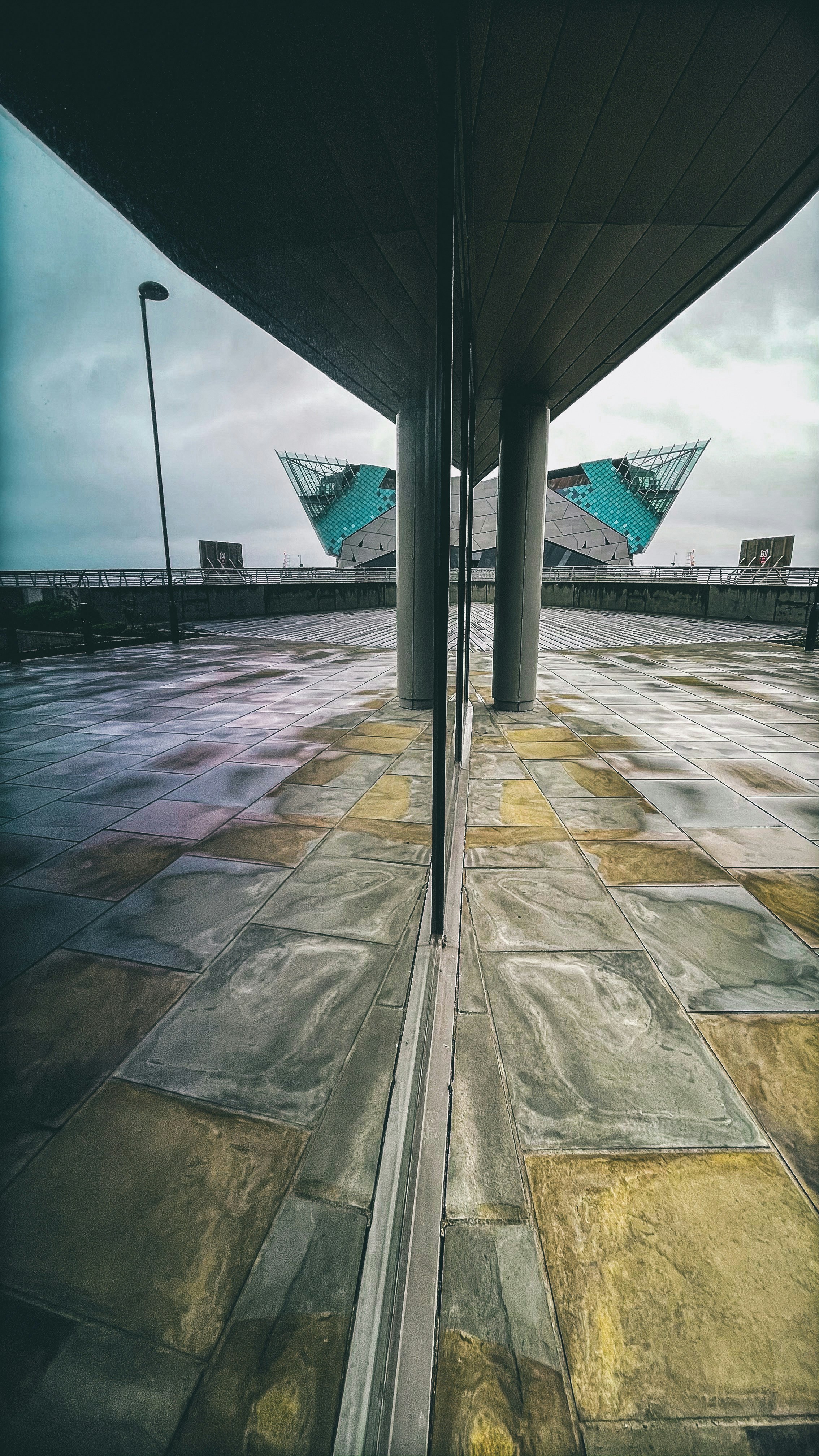 gray concrete building under gray sky during daytime