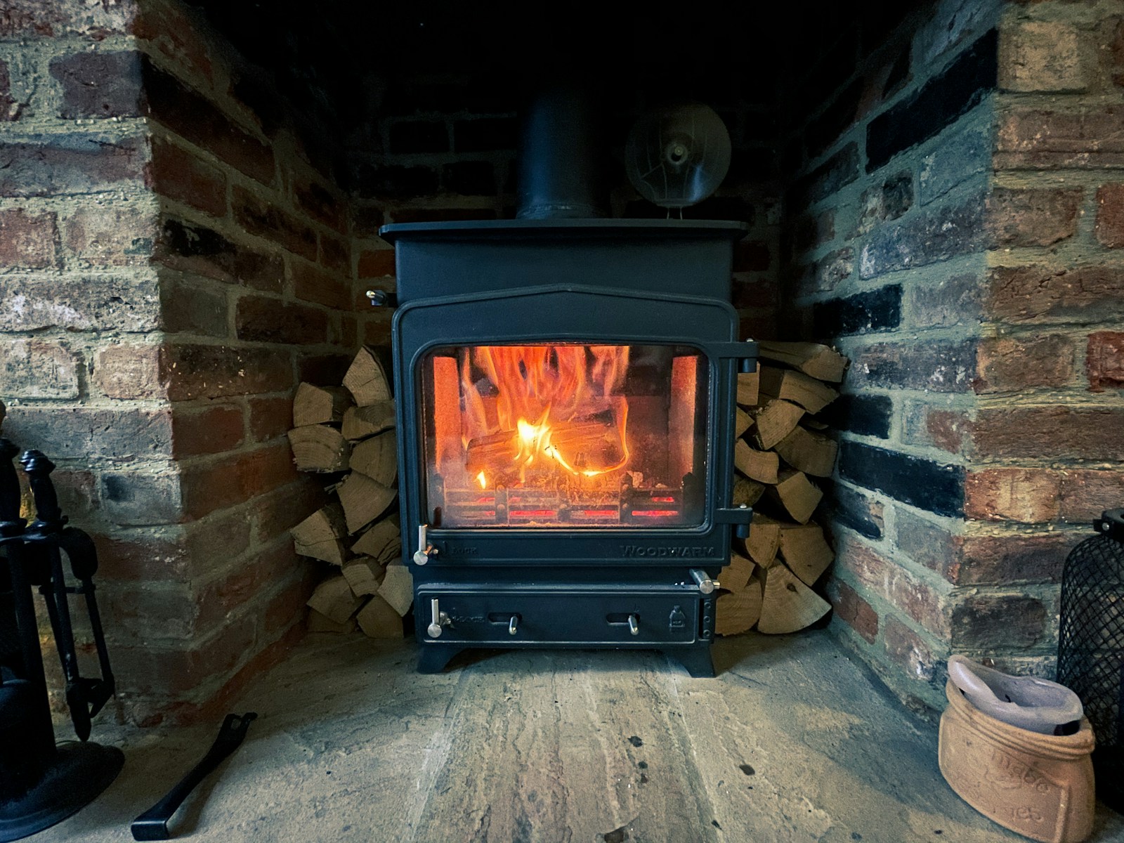 Heating with Heart: A Rural Realtor’s Guide to Wood Stoves and Insurance Requirements