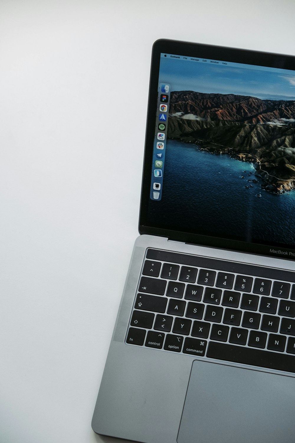 Macbook Pro Displaying Blue And White Wallpaper Photo Free Mac Book Image On Unsplash