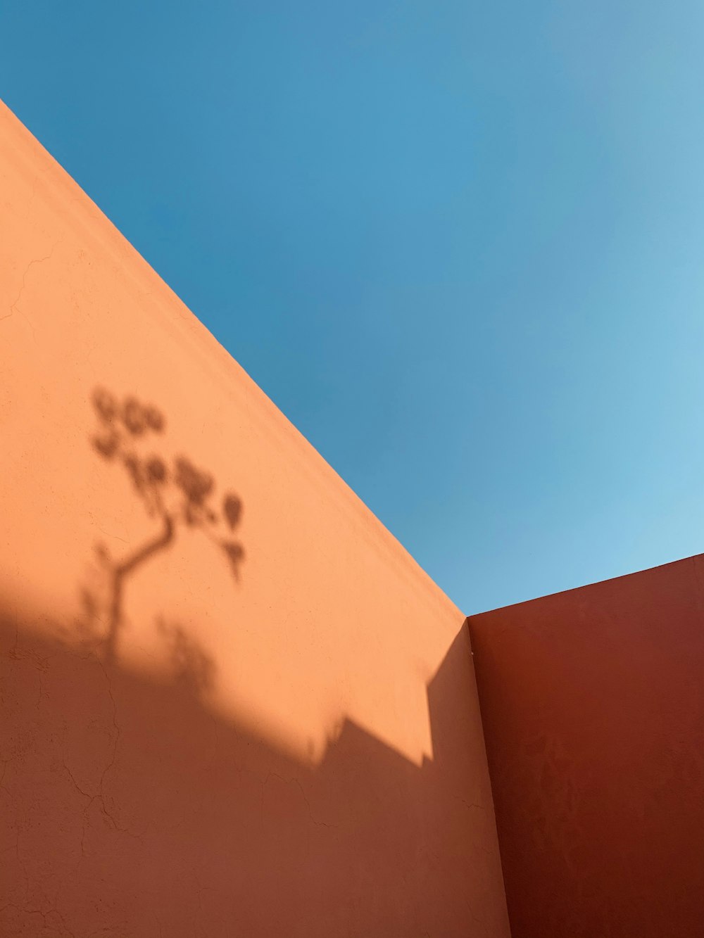 brown concrete building under blue sky during daytime