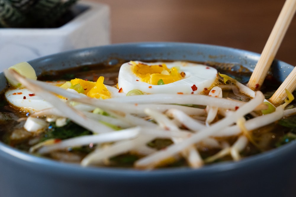 white ceramic bowl with yellow food