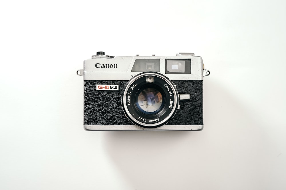 black and silver dslr camera