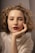 woman in white turtleneck sweater