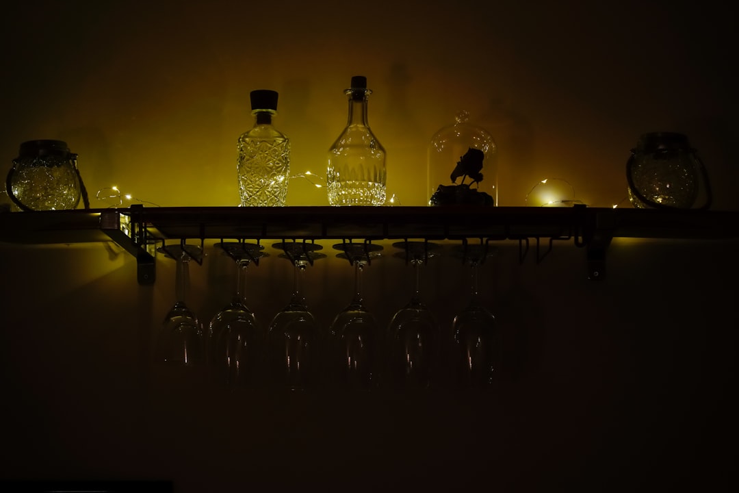 clear glass bottles on table