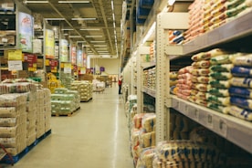 white metal shelf with food packs