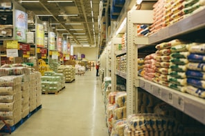 white metal shelf with food packs
