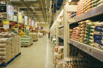 white metal shelf with food packs