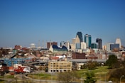 city buildings under blue sky during daytime