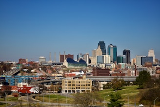 city buildings under blue sky during daytime