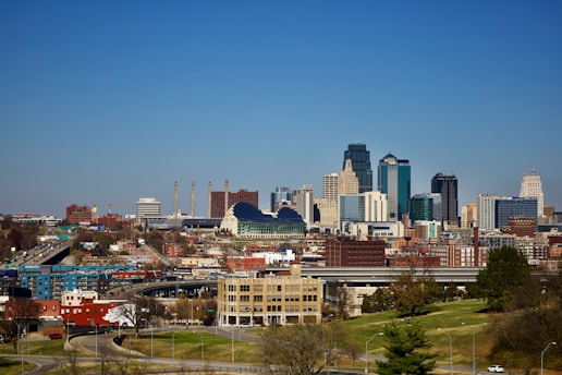 city buildings under blue sky during daytime