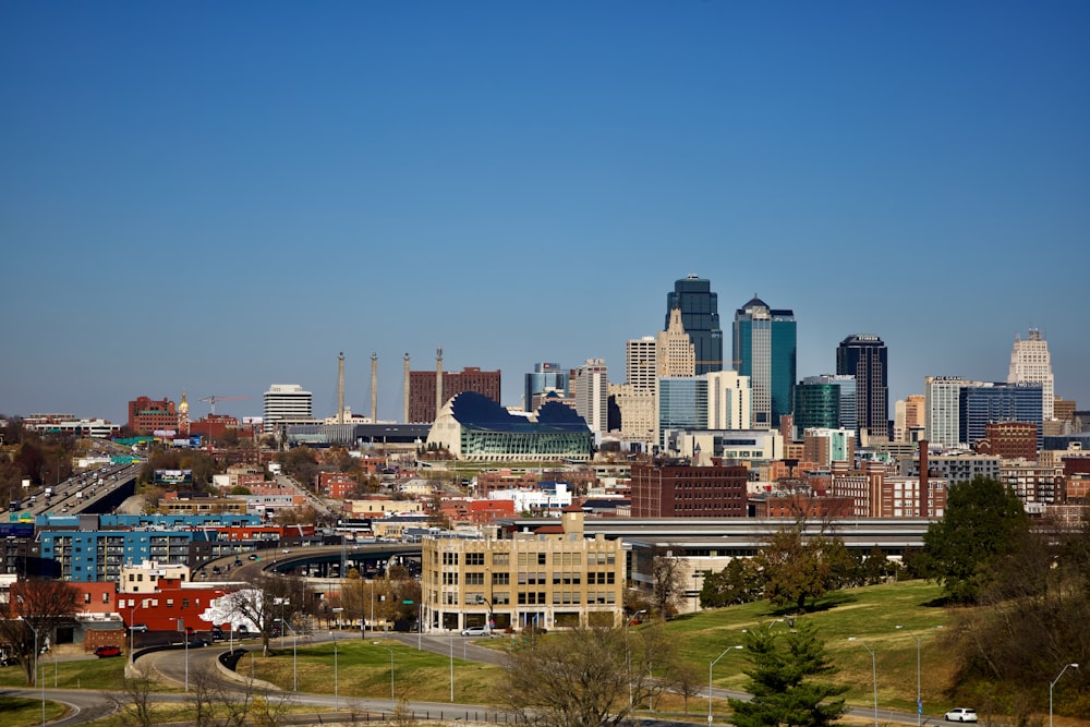 city buildings under blue sky during daytime