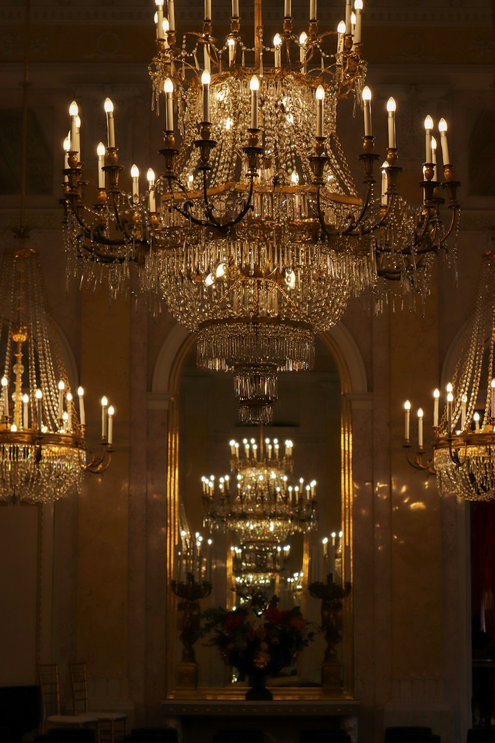 gold and white uplight chandelier