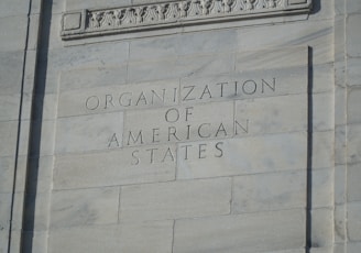 a sign on the side of a building that says organization of american states