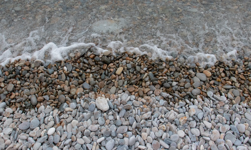 white and gray stones on the beach